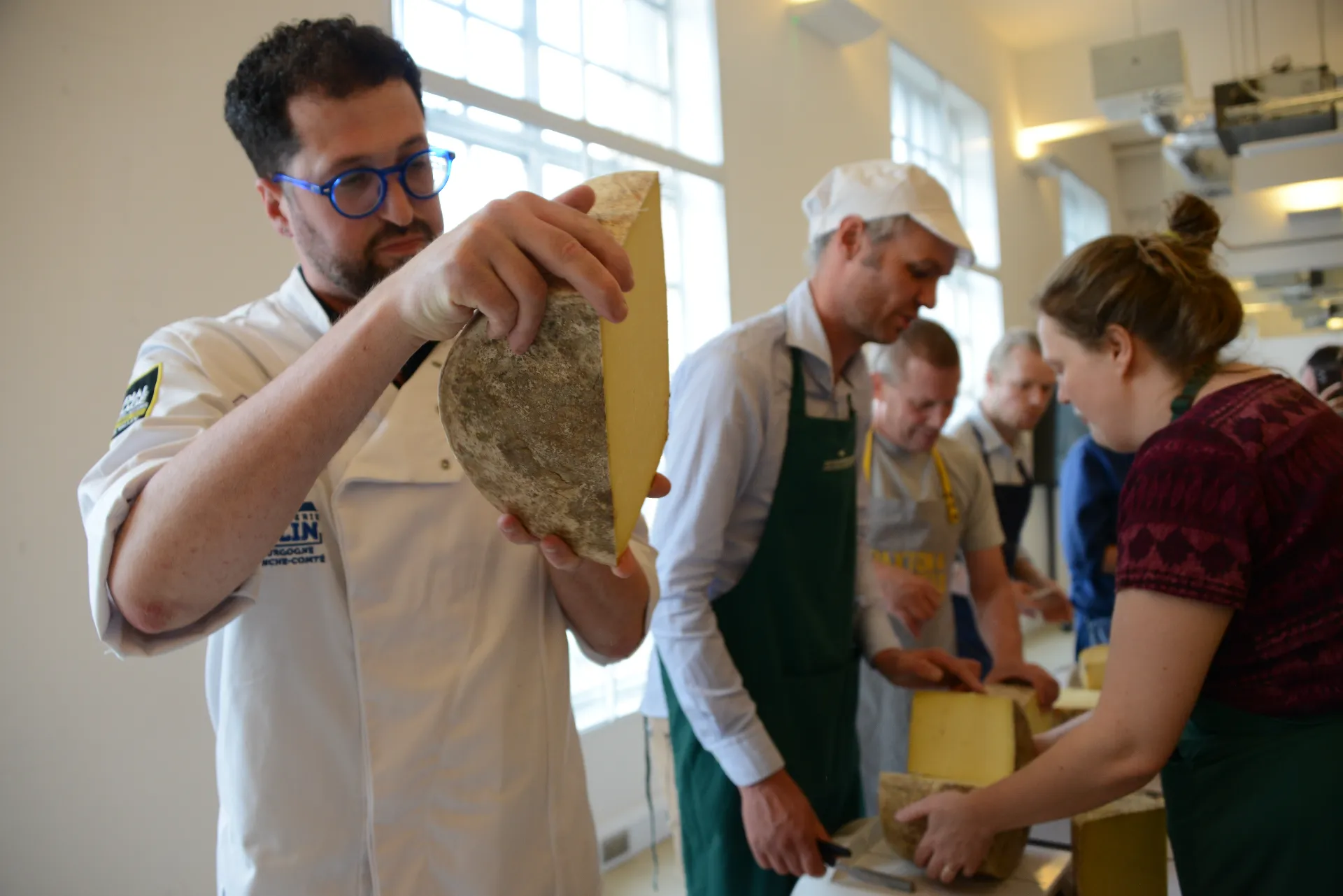 The Cheddar entries are inspected at the Affineur of the Year competition. Credit: Caroline Wood.