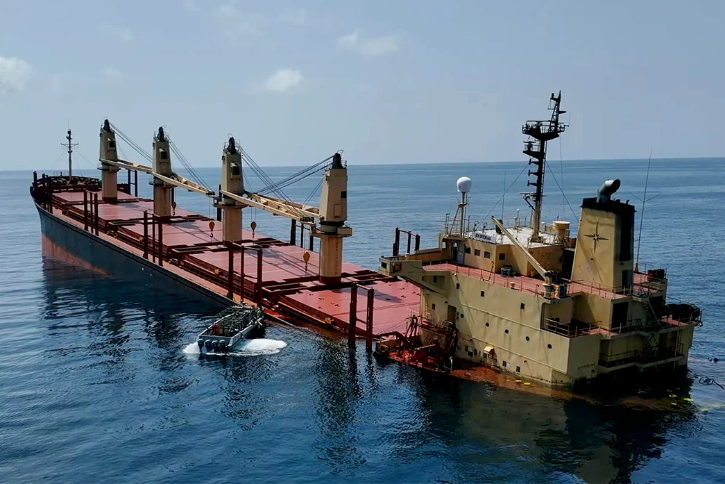 The British-registered cargo ship 'Rubymar' sinking, after it was attacked by Houthi forces in the Red Sea, on March 3, 2024. The Rubymar was carrying thousands of tonnes of fertiliser and now poses a significant threat to local marine life. 