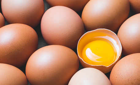 Why are some egg yolks so orange? 