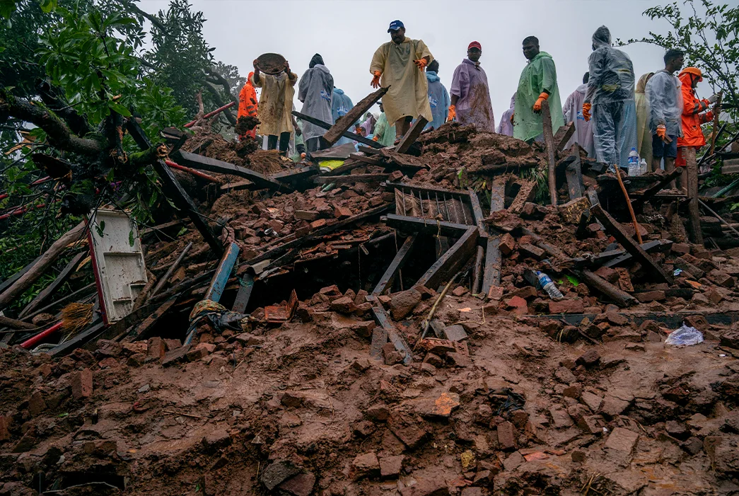 A rescue operation takes place following a landslide in Khalapur Irshalwadi Village, around 63 kilometers from Mumbai.  The incident occurred when the region was gripped by heavy rain. July 21, 2023. (Satish Bate via Getty Images)
